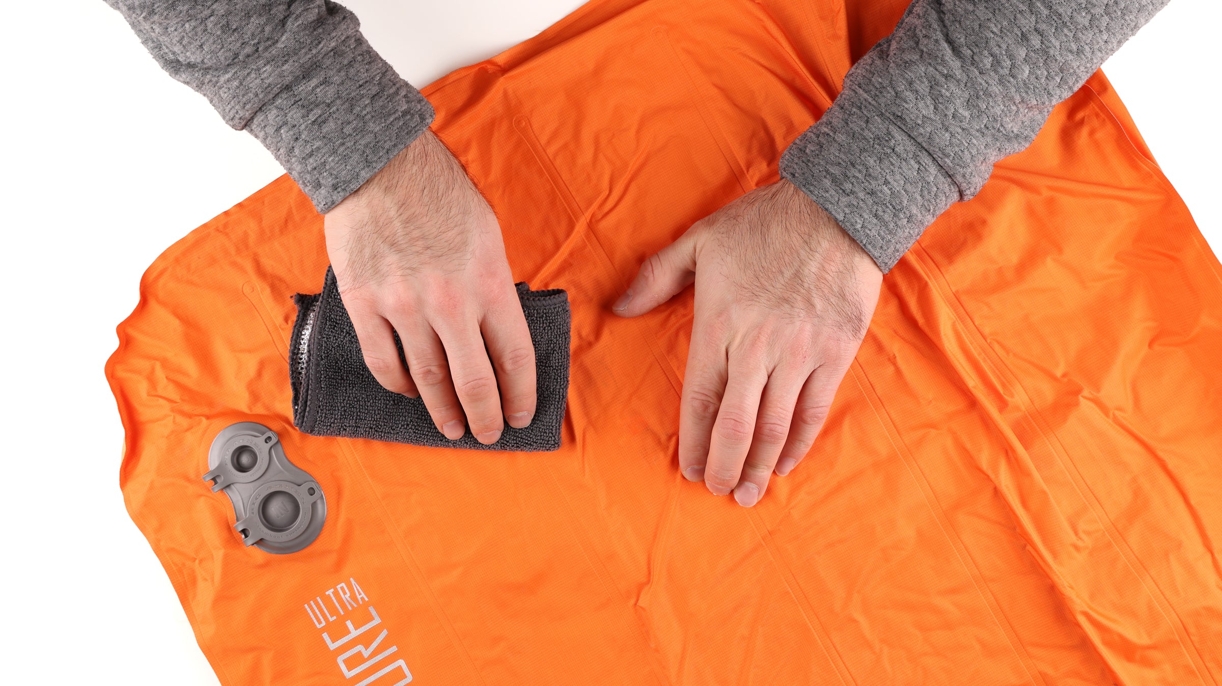 Wiping clean a air mattress with a cloth